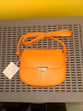 Primark Orange Faux Leather Textured Crossbody Saddle Bag with Gold Clasp. NWT